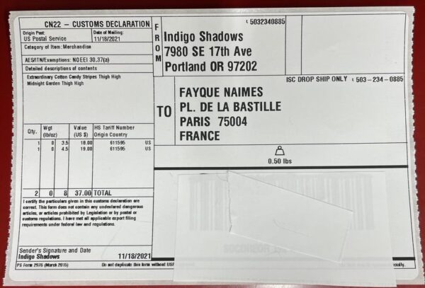 An international shipping label featuring the company name Indigo Shadows instead of Sock Dreams. It also shows customs information for the items contained, including the full item name